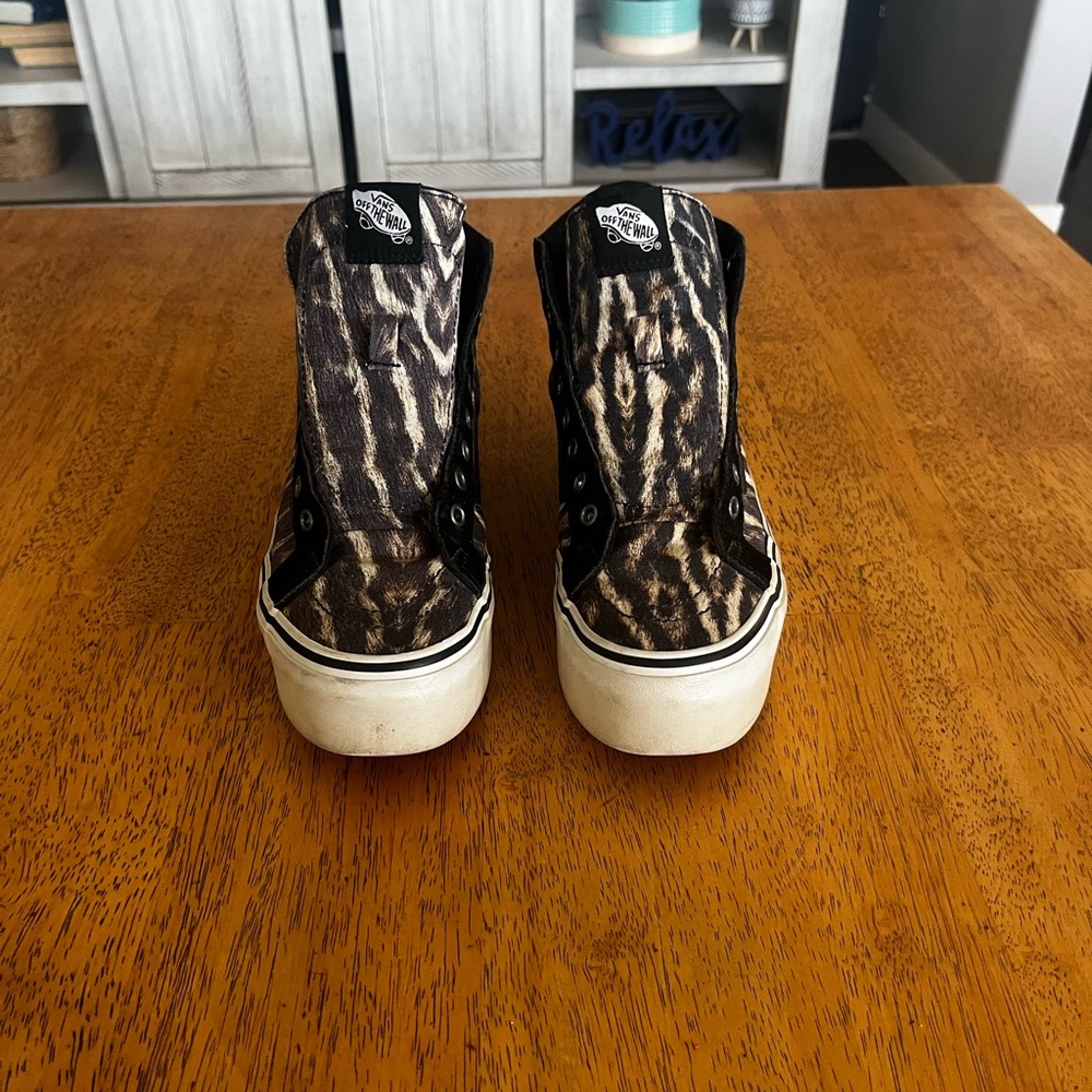 Vans High Top Sneakers in Black and Brown Animal Print
